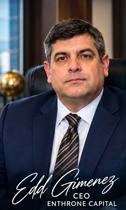 Edd Gimenez, CEO of Enthrone Capital, in a navy suit and striped tie, signed with his name and title
